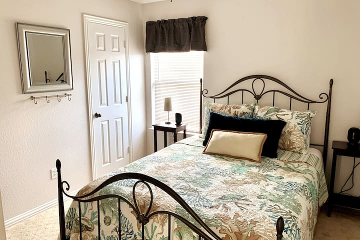 Bedroom #2, located upstairs, contains queen size bed and standard closet.