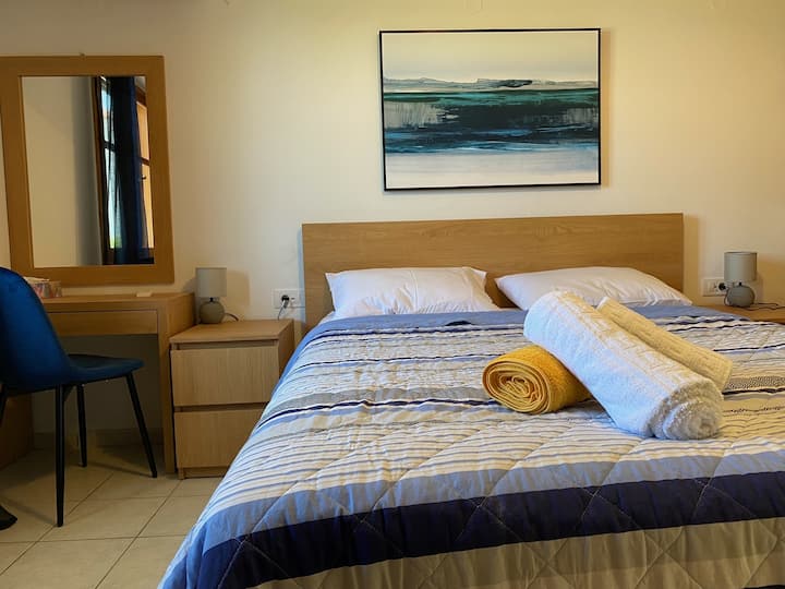 Main bedroom with direct access onto patio