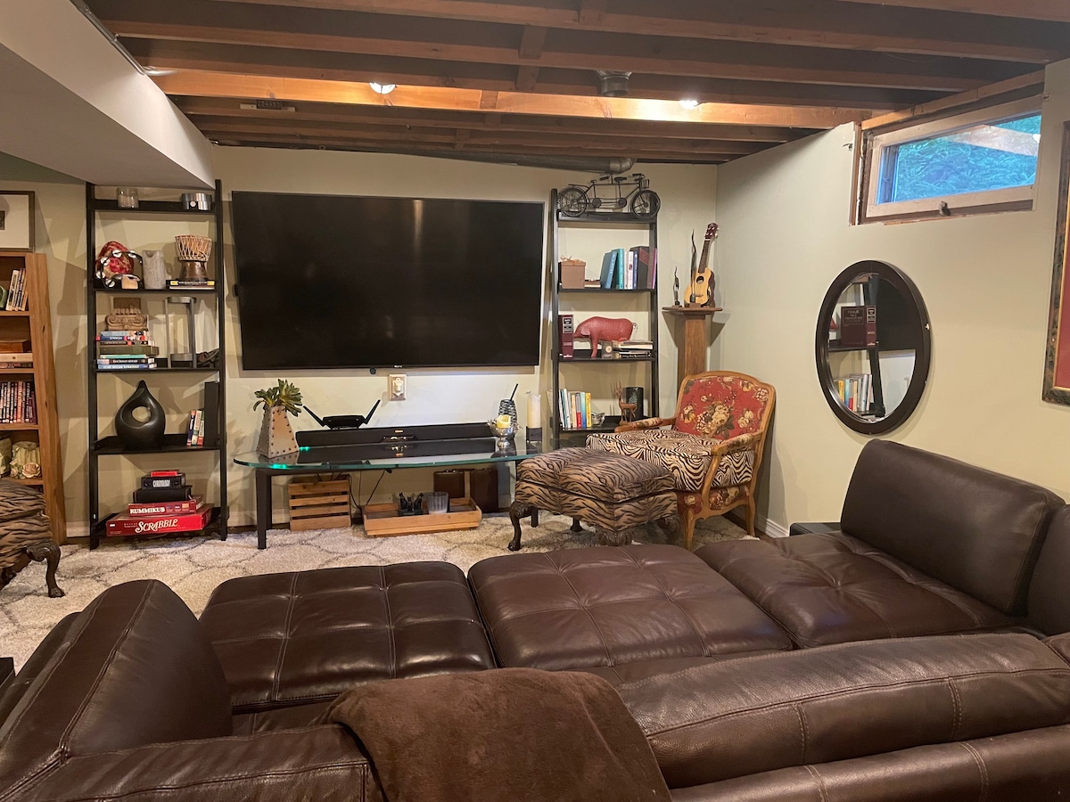 Cozy family room with giant TV on the lower level walk out