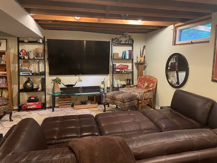 Cozy family room with giant TV on the lower level walk out