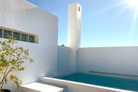 Designer home with rooftop pool and sweeping view