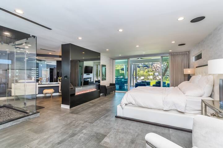 The master bedroom is sheer luxury! The glass sliding door leads straight to the backyard.