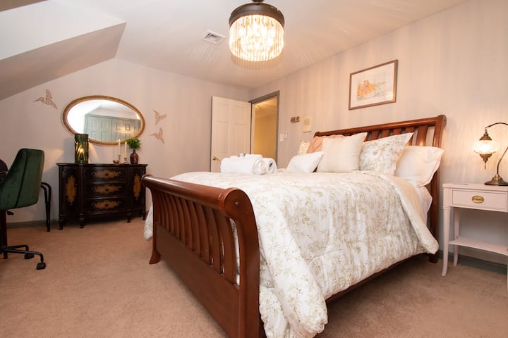 2nd level: The Diamond Beach suite (sleeps 2) with full size bed and antique desk.