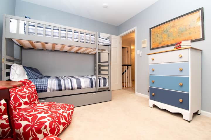 The Tigertail Beach Suite (sleeps 5) with a twin-over-twin bunk and twin trundle. plus a full-over-full bunk bed