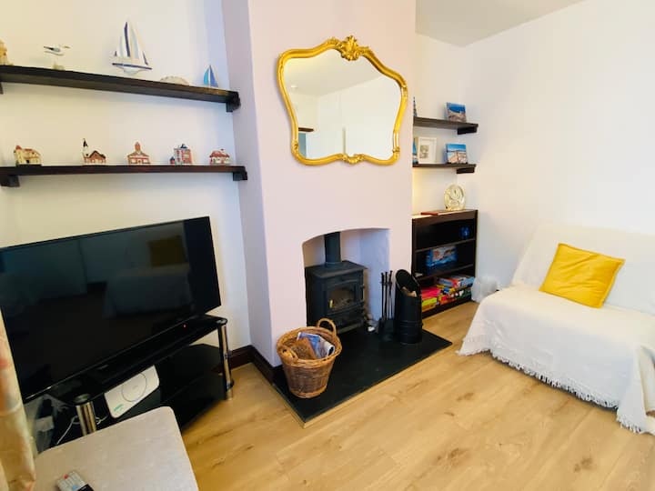 Living room with seating for 4 people. 