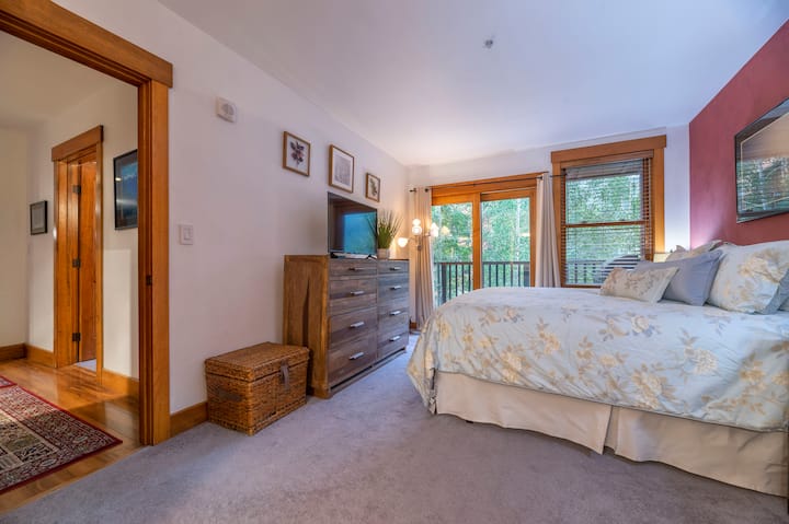 Master Bedroom 2--King bed, private bath, door to main deck, 3rd flat screen TV.