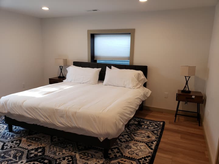 Basement bedroom #1 has a king size bed with lots of closet space and and en-suite bathroom