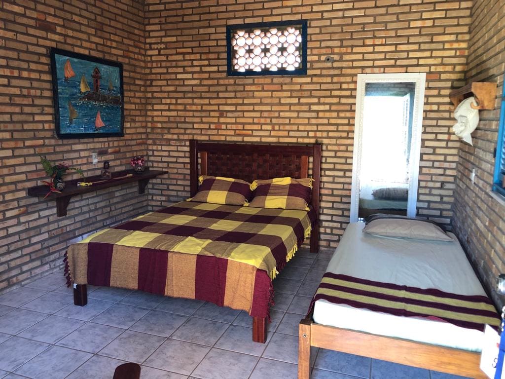 Espacio en la suite al aire libre n .º 05
Habitación con cama doble y cama individual. 