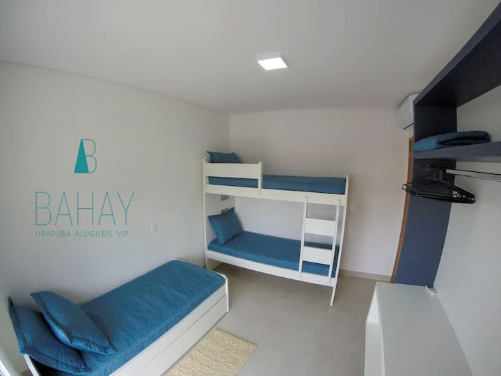 Dormitory 1. It has 1 bunk bed and 1 single bed with auxiliary bed. It holds 4 people. Air Conditioning, wardrobe with hangers and balcony door in blackout shutter coming out to the main balcony with barbecue.