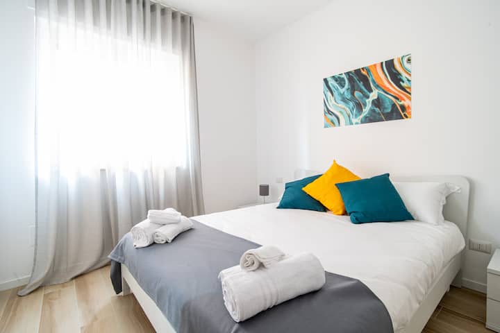 Apartment Maria bedroom  with window,  equipped with smart TV and  air conditioning