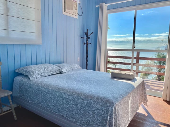 Room with a double bed and a single bed