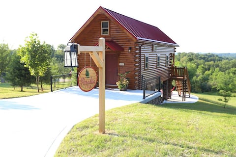 Amish vista al campo, cabaña de madera con bañera de hidromasaje