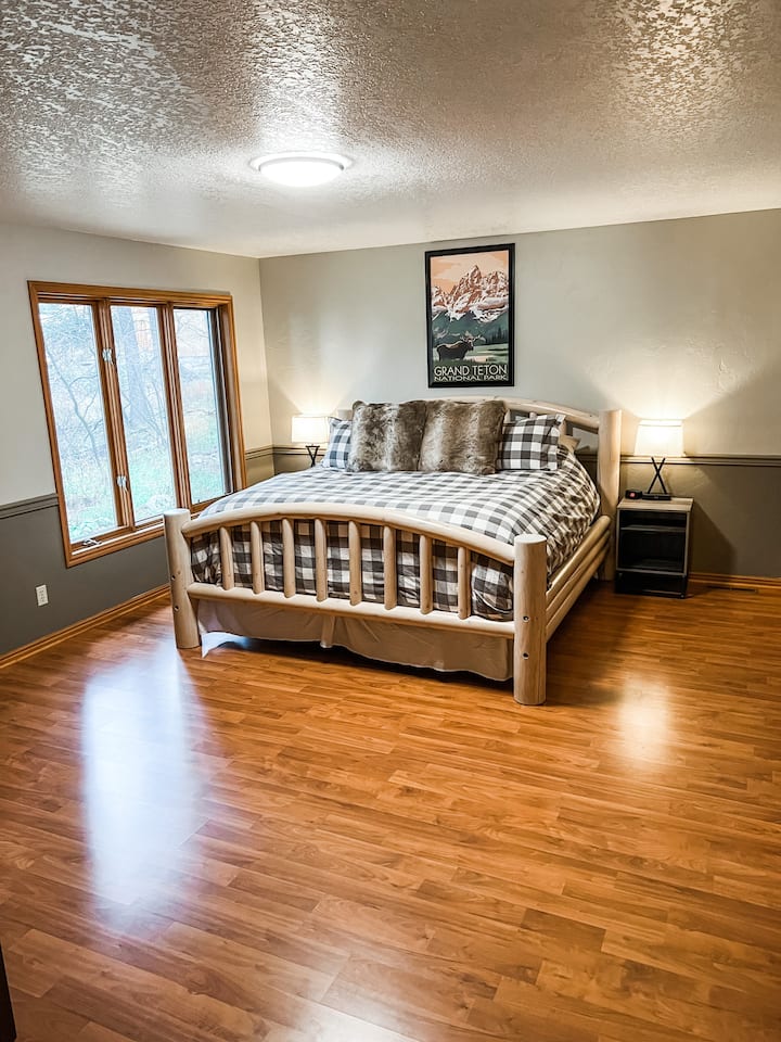 Master bedroom with King size bed, walk in closet and private bathroom. 