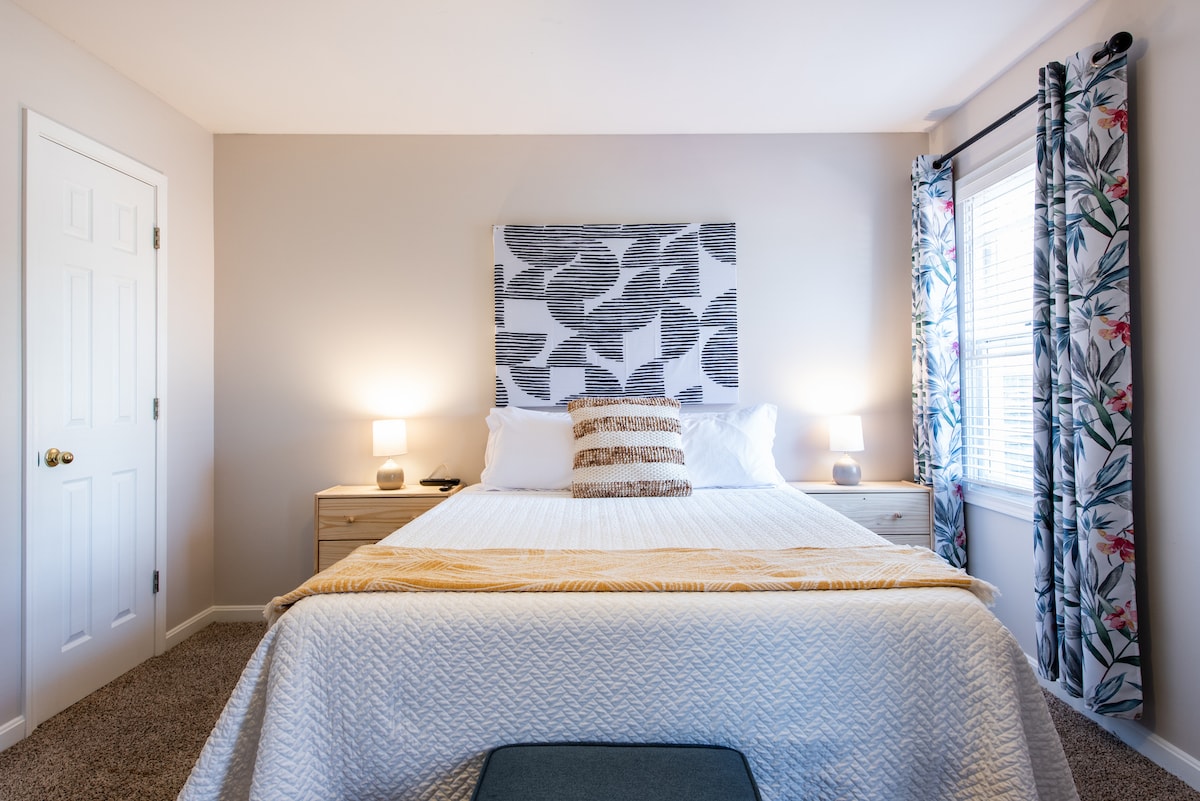 Bedroom three is located on the second floor and has tons of space. It features a queen sized bed, walk in closet, ceiling fan, desk, and Smart TV. 