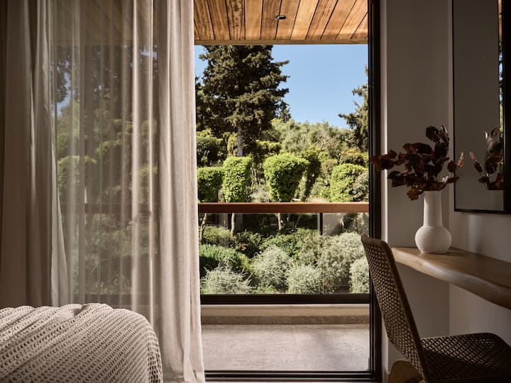 Bedroom balcony overlooking the pool & nature.