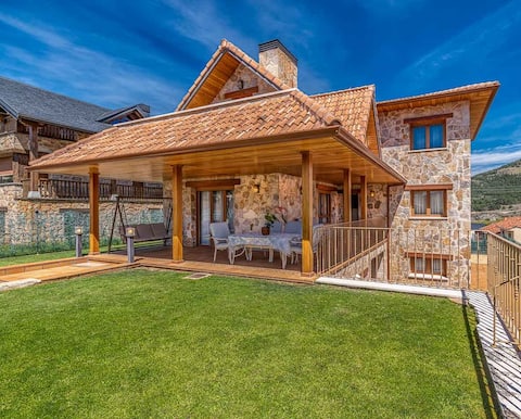 A nice chalet with an indoor fireplace and views.