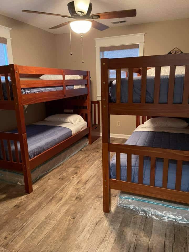 Bunk room with two sets of twin bunk beds