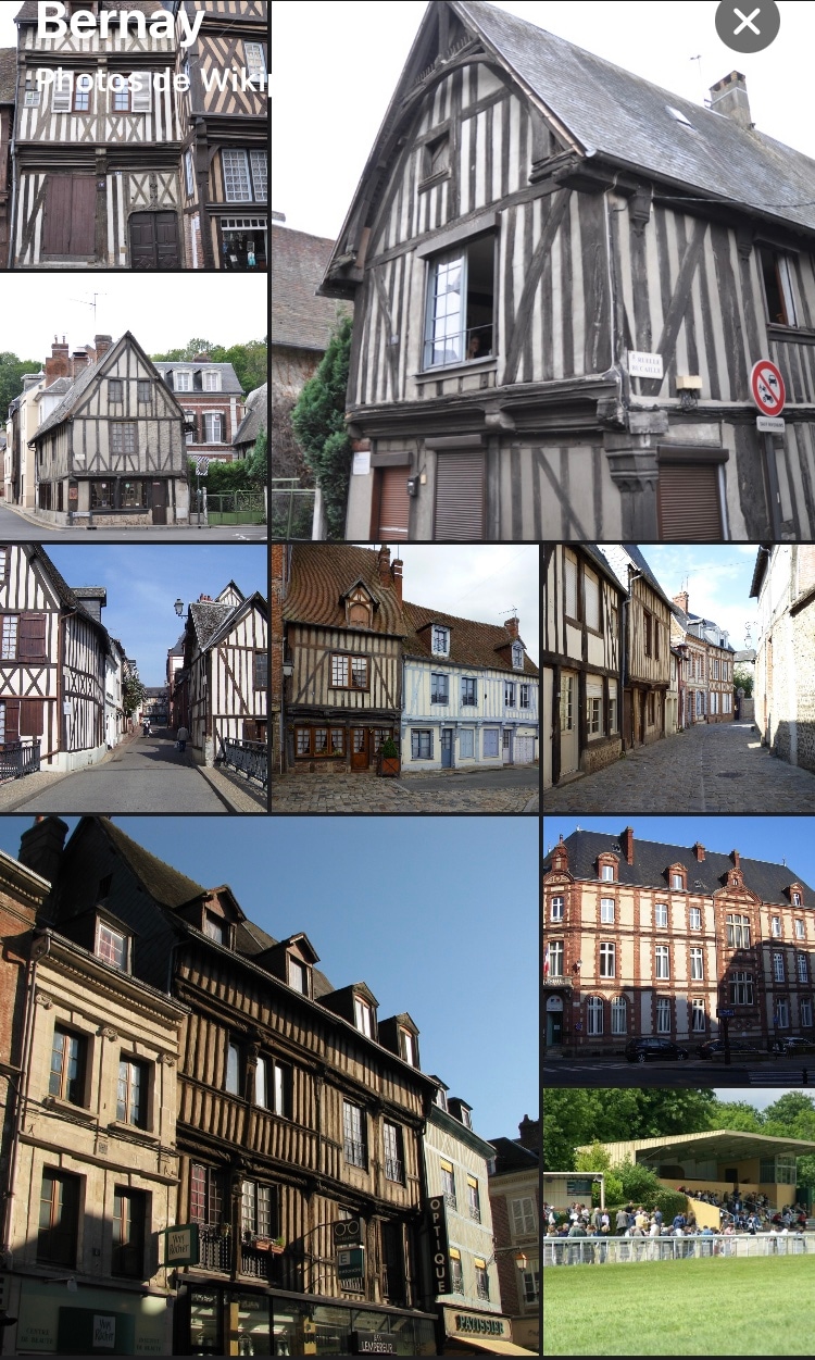 A collection of historical buildings in Bernay showcases traditional architecture characterized by timber framing and brickwork. Various facades are featured, revealing intricate designs and vibrant colors. The streets are lined with charming structures, creating a picturesque environment, while pedestrians can be seen enjoying the area.