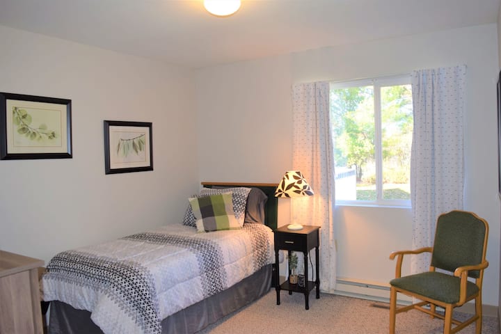 Watercolors (room 1, twin) is a favorite. It's right across from the shared bathroom (shower room), and is bright and cheerful.  It has a half bath, closet, dresser, and TV.