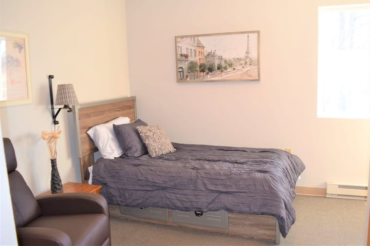 Paris.  Room 8, twin.  This room gets wonderful afternoon sun.  It's right off the living room, at the beginning of the south wing.  It has a half bath, closet, dresser, TV, and comfortable recliner.