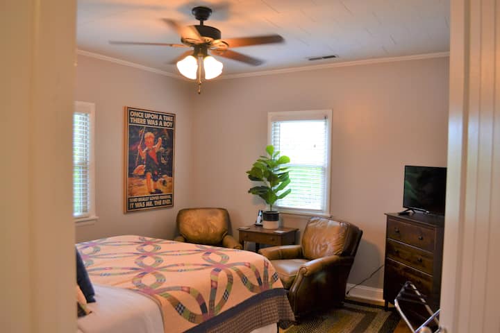Second bedroom has queen size bed with great views of the river and a relaxing reading area