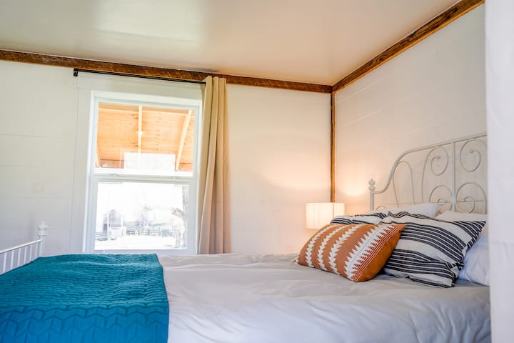 alternate angle of queen main level bedroom