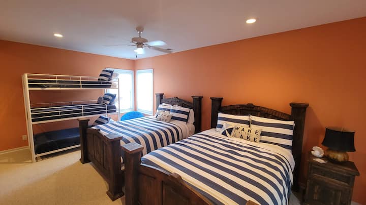 Perfect for kids or adults, Bedroom 4 features 2 queen beds and 3 twin bunks.