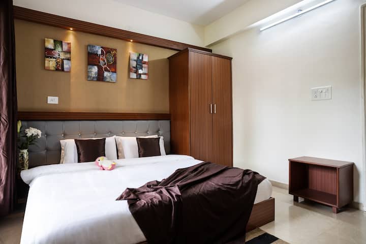 Modern King-Size Bed | Bedside Tables | 2 Bedroom Suite | Swimming Pool | Housekeeping Services