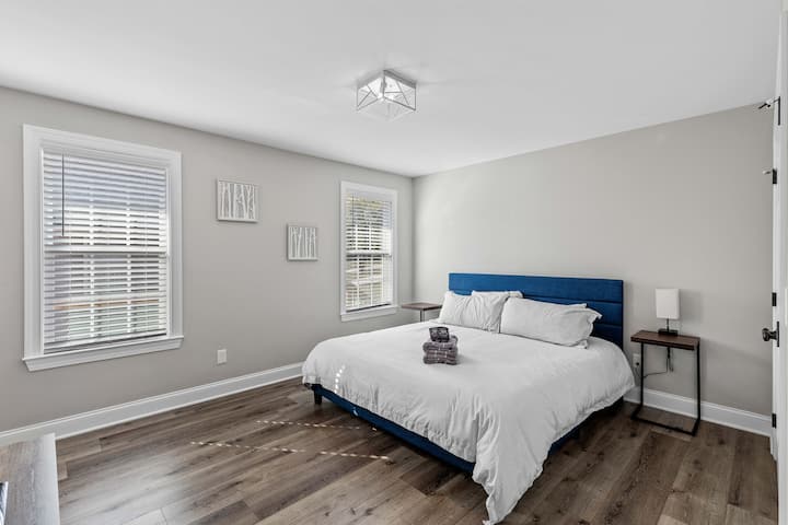Primary Bedroom with king bed and bathroom.