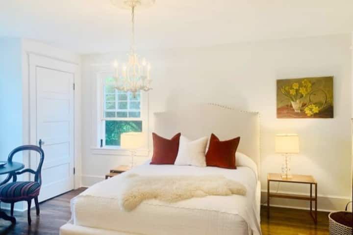 Pillow top mattress, comfort and simplicity define the master bedroom. From the window you can see the Tulip Magnolia...when in bloom, the most spectacular view... and home of happy birds. 
