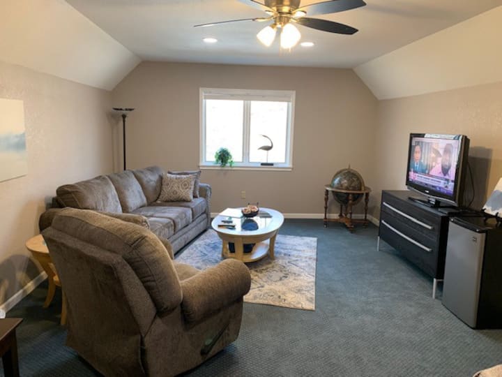 22' x 14' Bonus Room is a private living room for guests, plus has an extra bed.