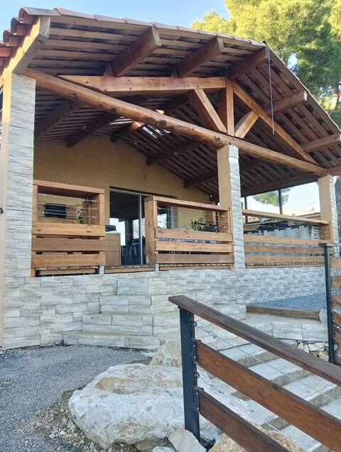 house with a hot tub and a quiet garden