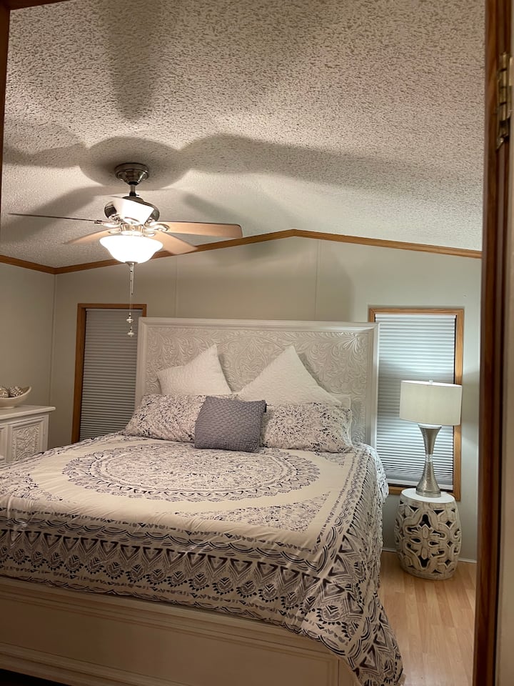 The Master Bedroom has a comfortable king bed and an en suite full bathroom