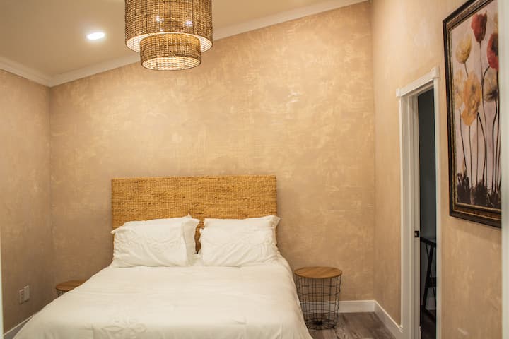 Bedroom 1

You can enjoy apple tv on a  60 inch Samsung flat screen tv.  French doors that open up to the backyard.  

Need some quiet space for work there is a small enclosed office within this room.

USB plugins for your electronics.