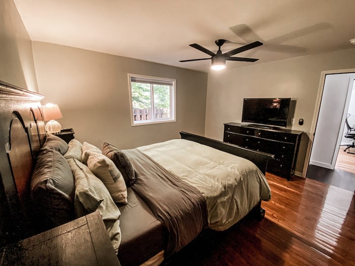 Downstairs bedroom w/ TV