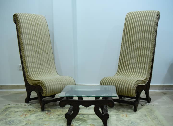 Elegant and comfortable chairs along with coffee table