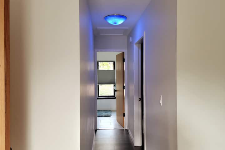 Hall way from Primary bedroom that leads to the Primary bath.