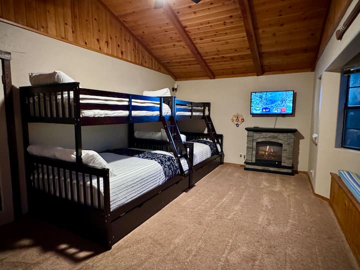 Bedroom #4 - The Bunk Room is a great place for adults or kids to sleep and play!  These bunks are Twins over Fulls with beauty rest mattresses.  The Bunk Room also has an electric fire place, smart TV, couch and some kid games.