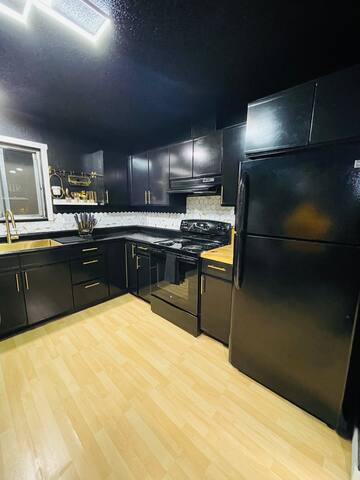 Hip Modern Condo – black & gold theme gallery image 3