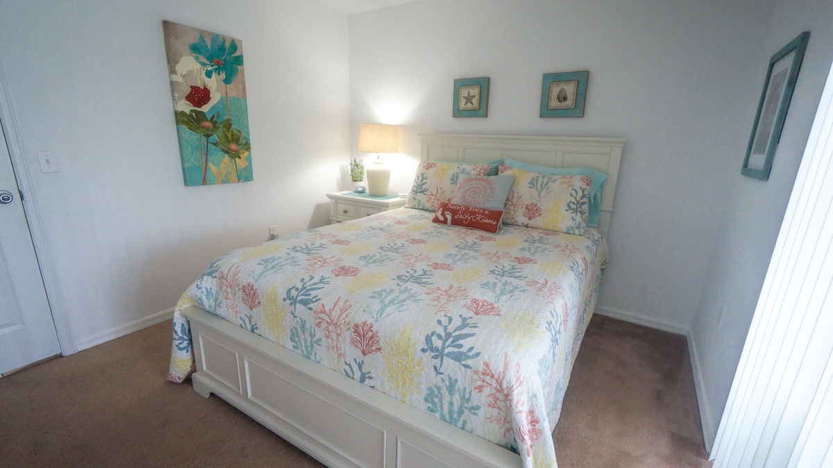 Queen Bedroom (downstairs) with brand new 43" LG UHD smart televisions.  Direct and private access to the pool.  This is the only room not equipped with Alexa enabled lighting.