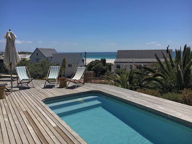 Surfsong beach apartment with pool and sea views