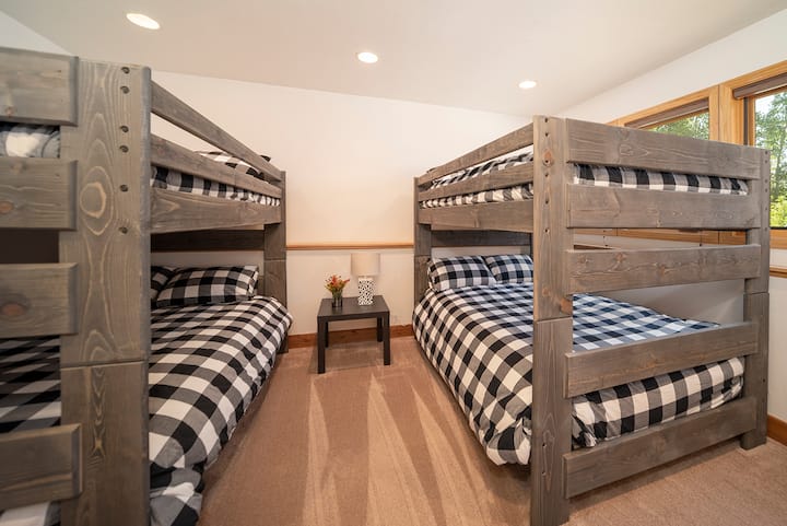 Bedroom 5 - four full beds, first floor, forest views