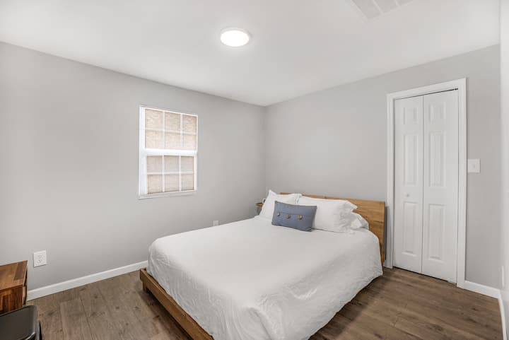 Our second bedroom sleeps two guests comfortably with a queen bed.