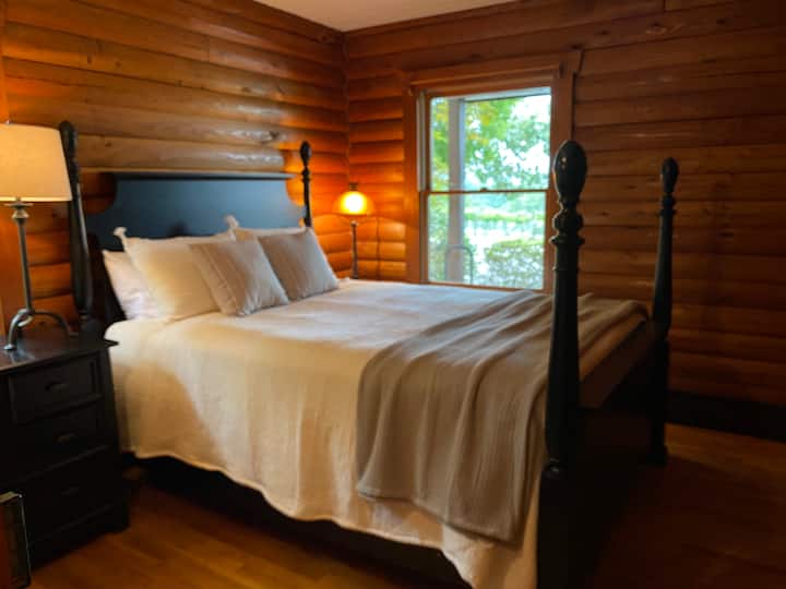 Private Queen bedroom located off the porch. Vineyard views.