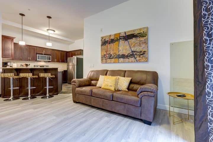 Stretch out and relax on our spacious couch, perfect for lounging after a day of exploring.