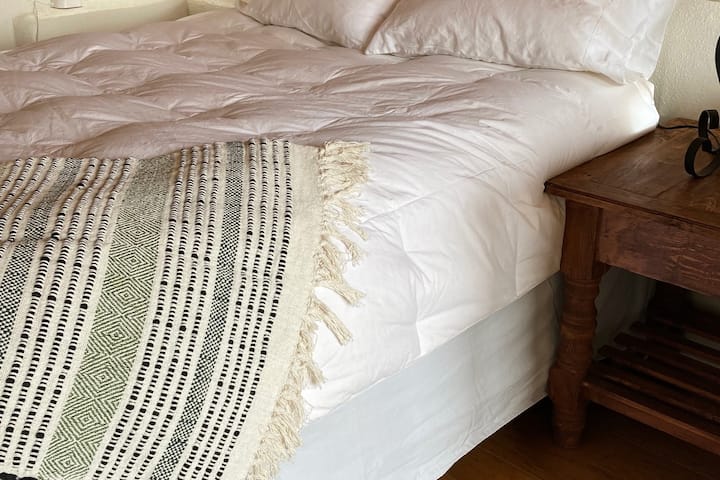 Loft queen bed with comfy linens