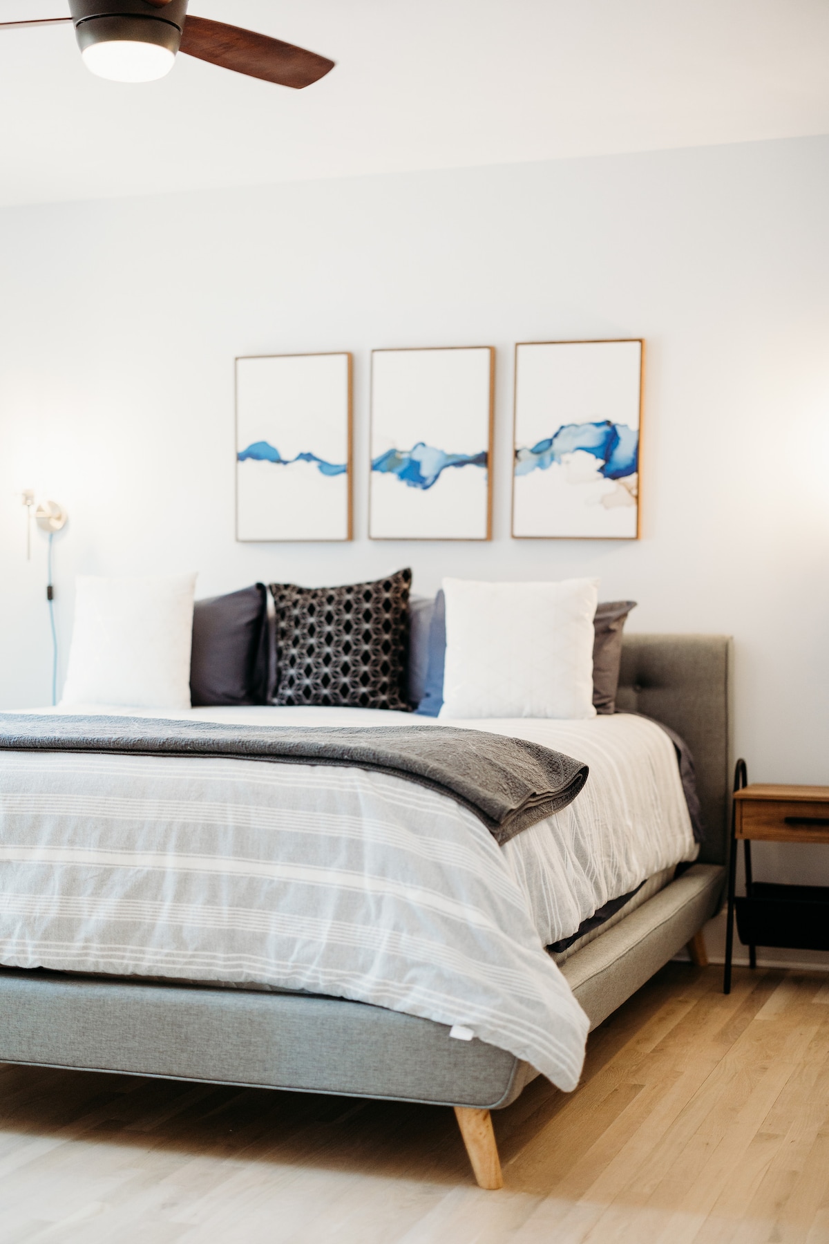 Retreat to the master bedroom with it's comfortable King Sized bed with firm mattress, organic sheets, and ample pillows. 55" Roku Smart TV, and French doors onto the wrap-around porch.