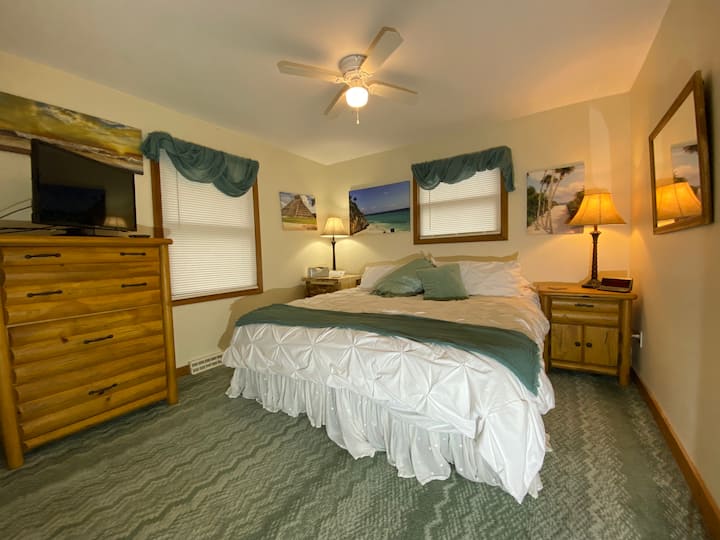 First Bedroom with King bed and 32" TV with Apple TV... Use AirPlay to watch your faves....