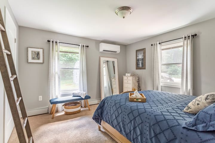 Blue bedroom off of hallway.