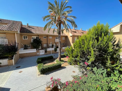Beach 4 bedroom townhouse meters from water